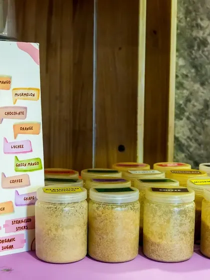 A display of various flavorings for our cotton candy, showing the wide range of choices available to guests.