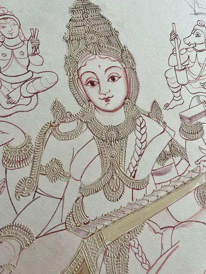 Mysore paintings are renowned for their captivating facial features. This close-up of Goddess Saraswathi shows how we infuse each artwork with beautiful and nuanced expressions for a timeless appeal.