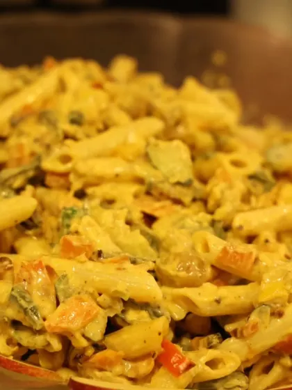 A creamy vegetable pasta salad, showcasing our ability to include continental dishes in our customizable menu.