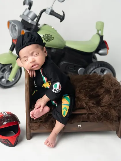A cool, relaxed pose from our newborn biker.