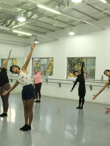 A beautiful moment of synchronized movement in our contemporary class. Students learn to move as one, creating a powerful visual effect.