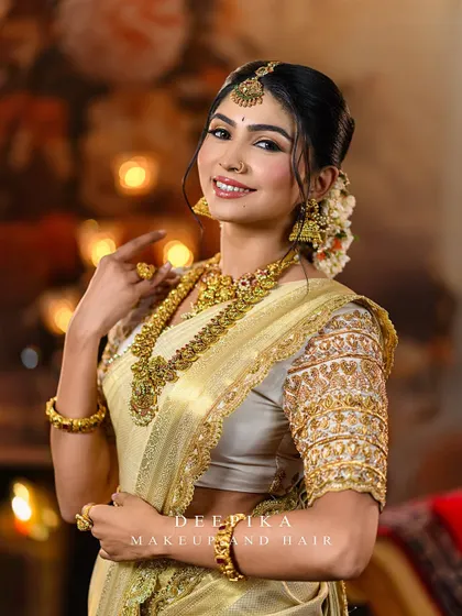A smiling model, her look exuding warmth and elegance, perfect for a wedding reception.