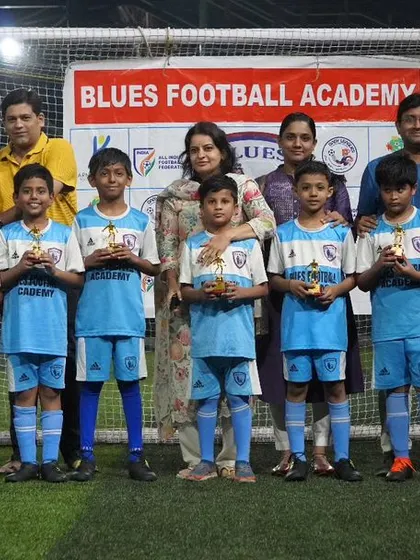 A group photo of our U9 and U10 award winners with their parents. This highlights the community and family involvement that I encourage.