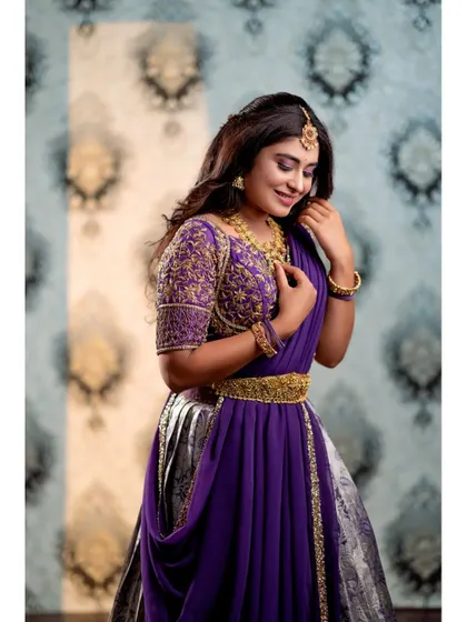 A duplicate of image 80, capturing a graceful and modest pose.