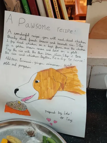 A "Pawsome Recipe" created, illustrated, and cooked by our children for the friendly street dogs who visit us.