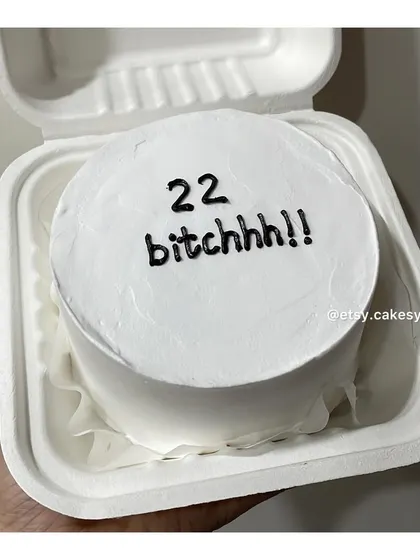 A cheeky "22 bitchhh!!" bento cake for a milestone birthday celebration.