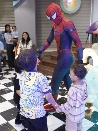 Spider-Man joins the kids on the dance floor. A character visit isn't just for photos; it's an interactive experience that becomes a core memory of the party.