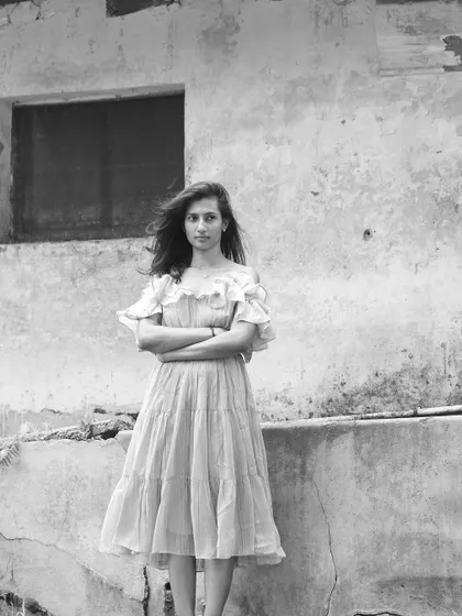 The same portrait in black and white, which adds a timeless and emotional depth to the image.