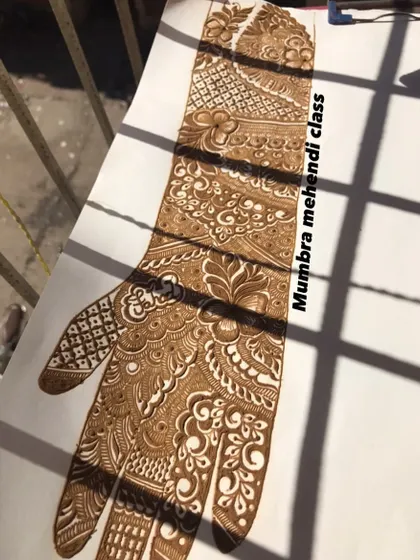 A bridal design I practiced on paper, which includes a space to write a name in Urdu.