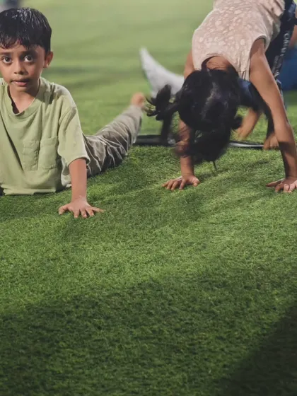 Our Cali Kids work on different variations of foundational poses like the cobra and downward dog, building strength and flexibility from the ground up.