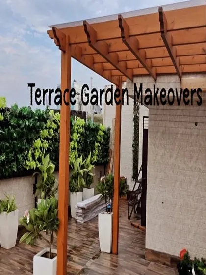 A classic wooden pergola with a transparent roof provides shelter from the rain without sacrificing sunlight. We paired it with an artificial leaf wall for privacy and greenery, creating a functional year-round space.