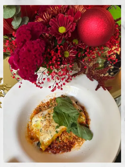 A comforting bowl of Cannelloni Florentine, a highlight from our Christmas-themed "Frosty's Festive Bowl" main course selection.
