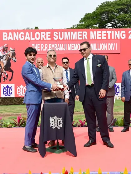 Mr. Kian Byramji presents The R.R. Byramji Memorial Million trophy to the owners of Flight of Fancy.