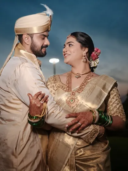 A romantic portrait of the couple at dusk. The makeup remains perfect, creating a timeless memory.