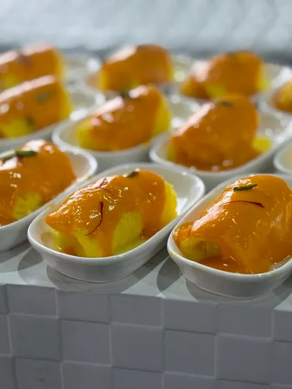 A seasonal favorite, this dessert features fresh mango with a creamy base, garnished with saffron. We love using seasonal fruits in our creations.