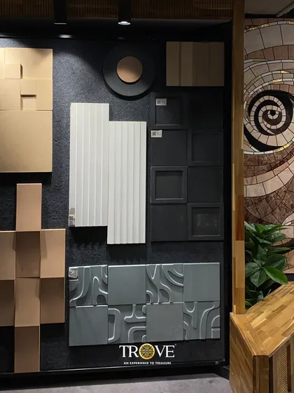 This mood board showcases a harmonious blend of textures and shapes. It combines 3D tiles, fluted panels, and a stunning spiral mosaic to inspire a sophisticated and modern interior.