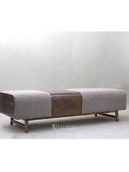 A full view of the dual-material ottoman, showcasing its long, clean lines and versatile design.