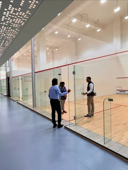 A glimpse of our air-conditioned ASB System 100 squash courts, the gold standard for professional play, offering a perfect environment for training and tournaments.