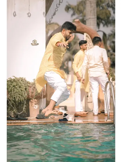Capturing the action and excitement of a Haldi pool party. These dynamic shots are full of energy.