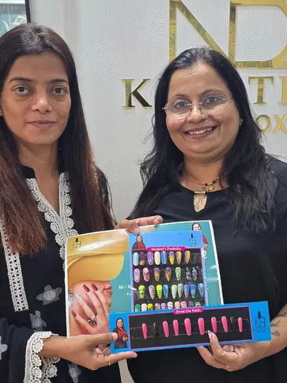 Pallavi showcasing her portfolio of nail designs created during the course. This is the tangible result of hands-on practice and mastering various art techniques.