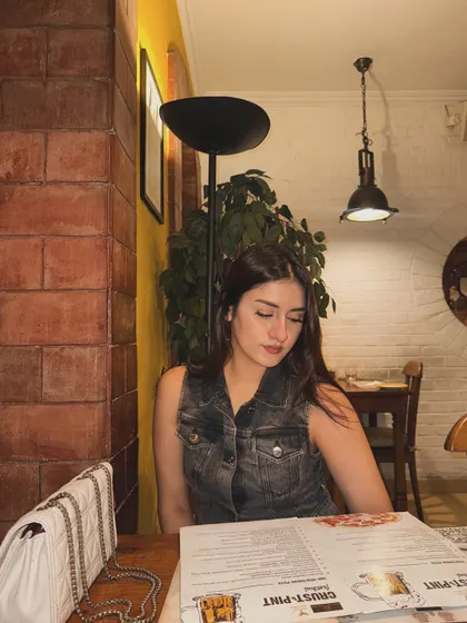Contemplating the menu, still in my casual denim look.