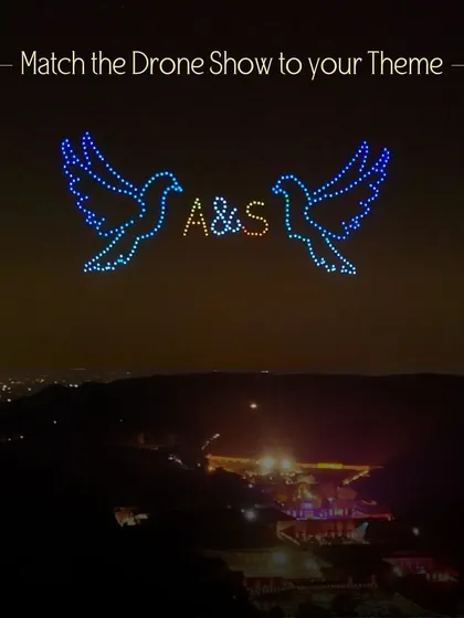 We match the drone show to your wedding's theme. For this couple, we created two doves holding their initials, a classic symbol of love and peace, perfectly customized to their story.
