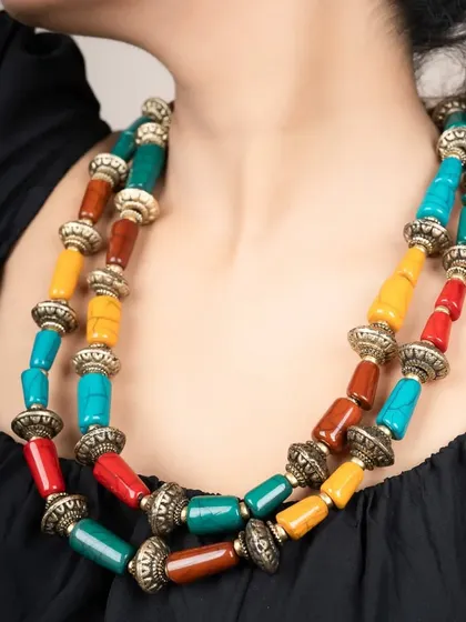 A vibrant shot of a multi-colored beaded necklace. I ensure the colors are bright and true-to-life to attract customers.