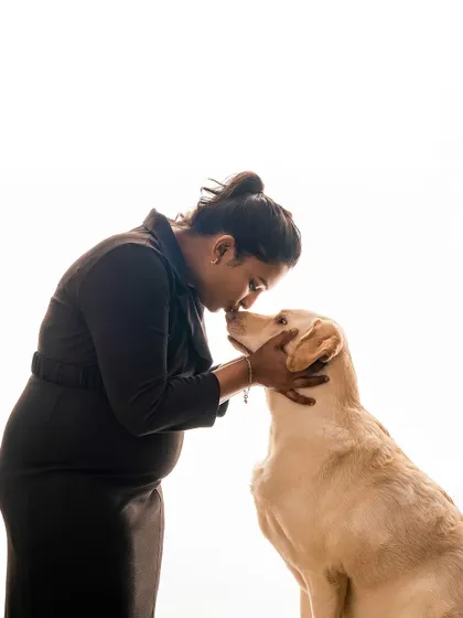 A similar pose showing the deep affection between a woman and her dog. These intimate moments are the heart of my maternity with pets sessions.