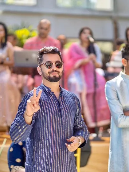 Channeling my inner Bollywood hero during a daytime wedding event. My performance style is heavily inspired by stars like SRK and Hrithik, bringing that cinematic energy to your celebration.