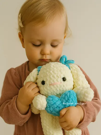 A precious moment captured with a little one and our handmade bunny plushie. We use only baby-safe materials, so you can be sure our toys are gentle and safe for even the youngest children.