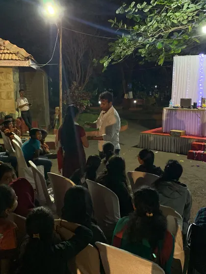 Interacting with an audience member during an evening performance. My stage shows are not just about tricks; they are about creating a connection with the audience and sharing a few laughs along the way.