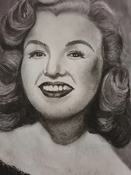 This is a finished charcoal portrait of the classic Hollywood icon, Marilyn Monroe. We often study famous faces in my workshops to master capturing recognizable features and glamorous expressions.