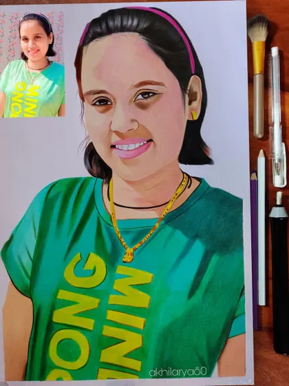 This A3 colored pencil portrait has a bright and cheerful feel, thanks to the green t-shirt and the subject's happy smile.