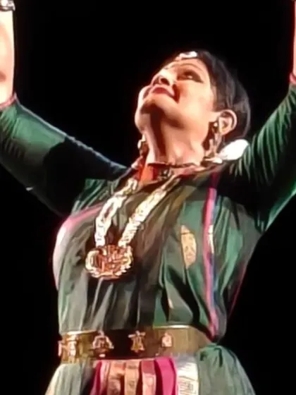 The arms extended in a gesture of expanse and grace. This photograph from my Kolkata performance highlights the beautiful lines and sculptural quality of Bharatanatyam.