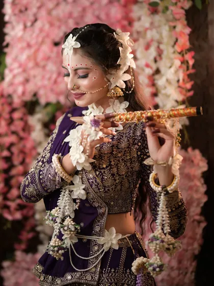 Another beautiful shot of our model as Radha, playing the flute.