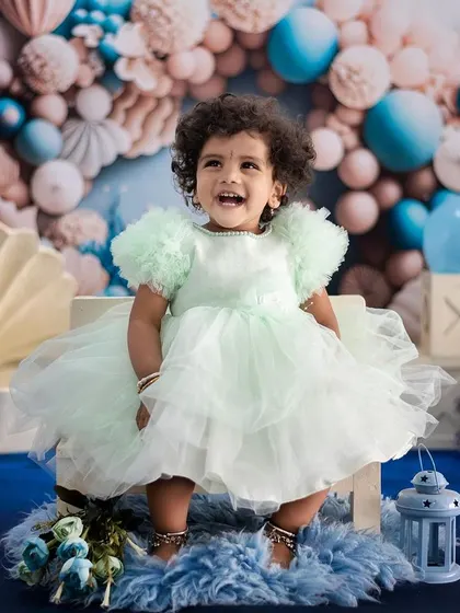 Look at that laugh. Our goal with toddlers is to let them play and be themselves, allowing us to capture their true, unfiltered personality in a relaxed studio setting.