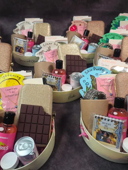 An assortment of our budget-friendly and beautiful bridesmaid hampers. We can customize the contents to fit your theme and ensure your special occasion is celebrated in style.
