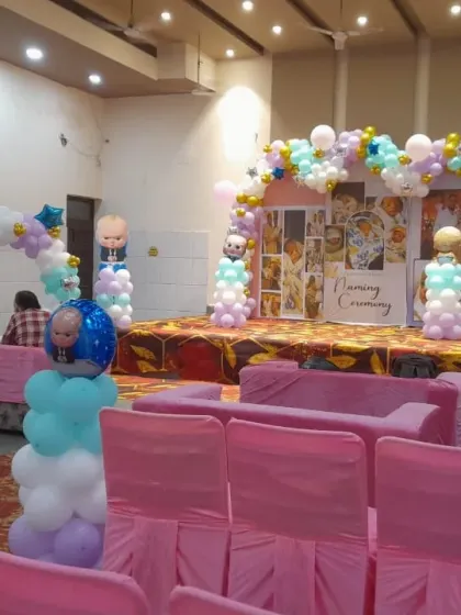 Another view of the Boss Baby themed naming ceremony stage and hall.