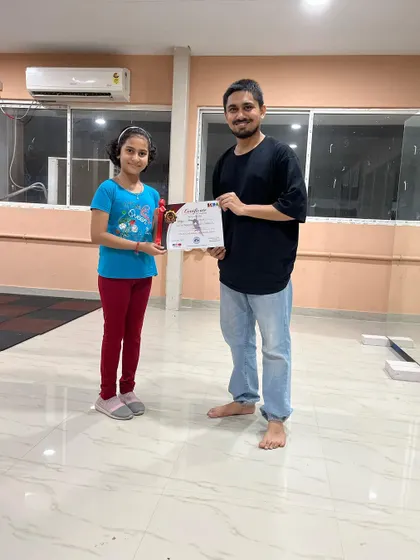Students from my kids' batch receiving their certificates. I offer certification to validate the hard work and dedication they put into their training.