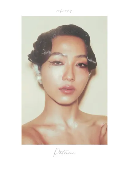 Another polaroid-style portrait from the "Patricia" series. The direct, head-on composition and the subtle, "smudged" eyeliner give this shot a raw and honest feel.