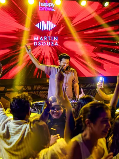 A great shot of me with the crowd's hands reaching up towards the console.