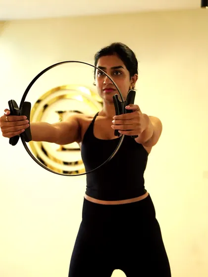 Using props like the Pilates ring helps us connect to the right muscles. It's a simple tool that provides instant feedback, ensuring every movement is effective and intentional. This is where you really feel that burn.