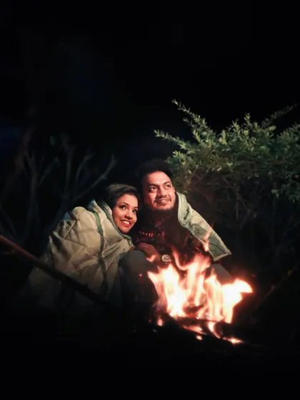 A cozy and unique pre-wedding photo by a campfire at night. I am always open to creative ideas to make your shoot one of a kind.