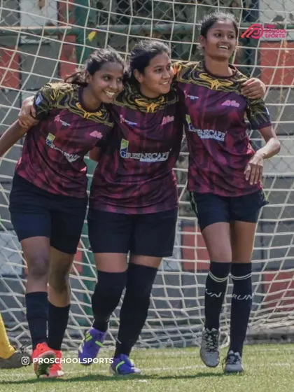 Three of our female players celebrating a moment together on the field. The smiles say it all.