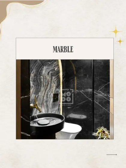 Marble is a timeless choice for a luxurious washroom. Here, dramatic black marble with white veining creates a bold and sophisticated backdrop for a modern bathroom design.
