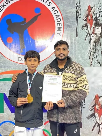 Rohan proudly displays his gold medal from the 6th National Sikh Games. His hard work and training are an example for others.