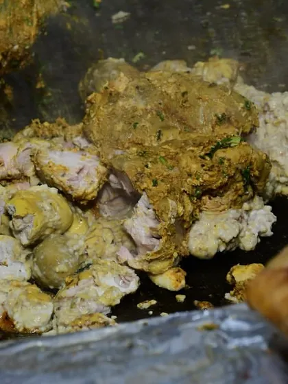 Our Gurda (kidney) and Bheja (brain) fry being cooked on the tava with a mix of masalas. A true delicacy for those who love offal dishes.