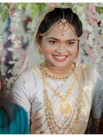 A close-up of a bride's radiant smile during her wedding ceremony, her face full of joy and excitement.