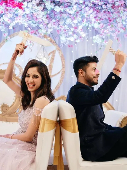Capturing the fun and games that make an engagement party memorable. This shoe game moment is filled with laughter and personality.
