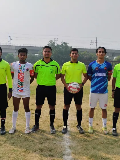 The captains with the match officials before kick-off in the HCL Youth League.